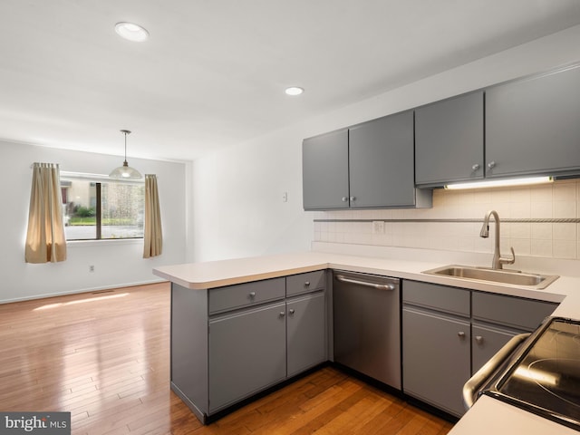 398 Lynetree Dr Unit 11-D, West Chester, PA 19380 - kitchen featuring gray cabinetry, dishwasher, a peninsula, decorative backsplash, and recessed lighting