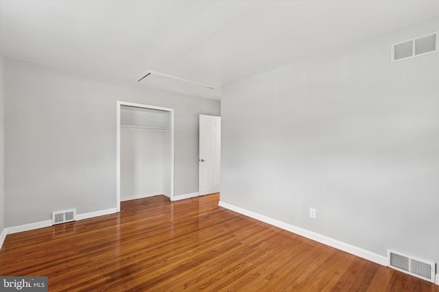209 Riverview Rd, King Of Prussia, PA 19406 - unfurnished bedroom featuring attic access, a closet, and wood finished floors