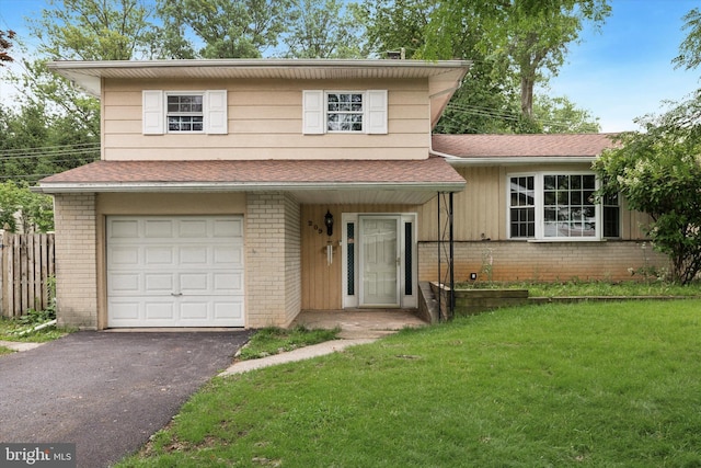 209 Riverview Rd, King Of Prussia, PA 19406 - split level home featuring brick siding, a garage, driveway, and a shingled roof