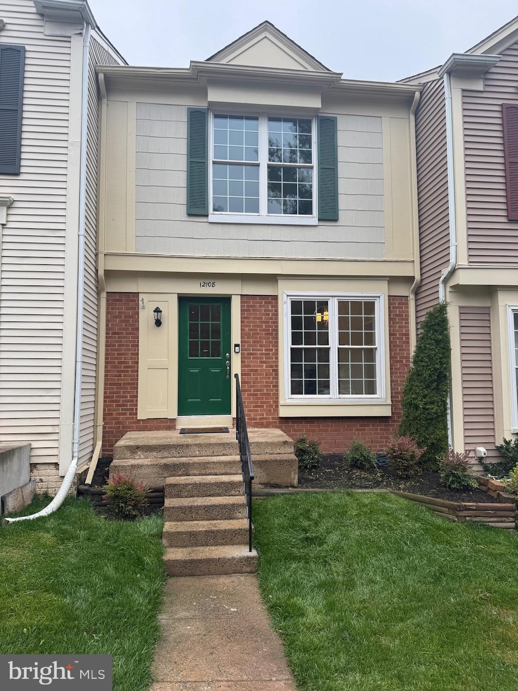 12108 Wedgeway Pl, Fairfax, VA 22033 - view of front of house featuring brick siding, a front lawn, and entry steps