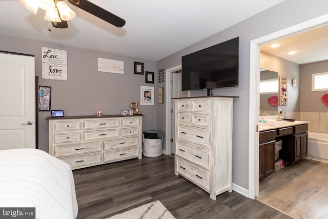 5 N Edinburgh Ct, Houston, DE 19954 - bedroom with dark wood-style flooring, ensuite bathroom, and ceiling fan