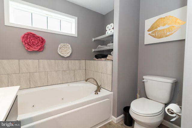 5 N Edinburgh Ct, Houston, DE 19954 - bathroom with a whirlpool tub, wood finished floors, and vanity
