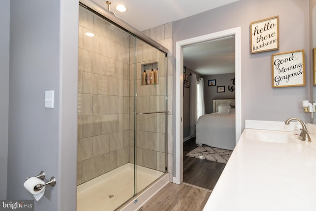 5 N Edinburgh Ct, Houston, DE 19954 - bathroom featuring ensuite bathroom, a shower stall, wood finished floors, vanity, and recessed lighting