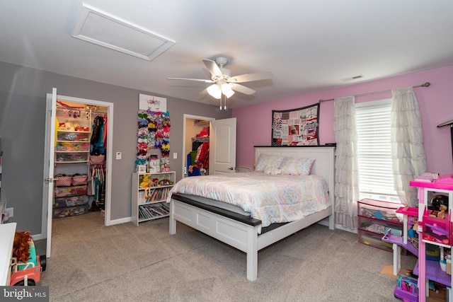 5 N Edinburgh Ct, Houston, DE 19954 - bedroom featuring attic access, a walk in closet, carpet, a closet, and ceiling fan