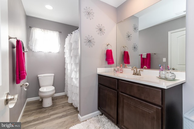 5 N Edinburgh Ct, Houston, DE 19954 - bathroom featuring wood finished floors and vanity