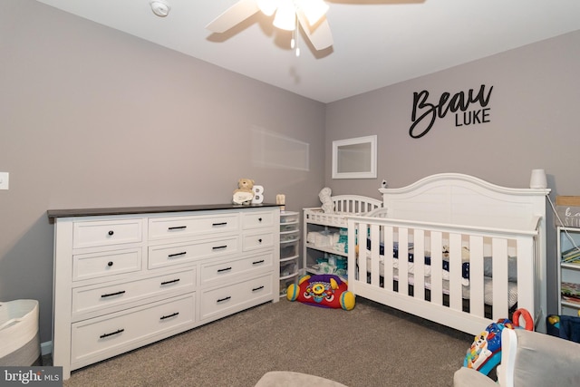 5 N Edinburgh Ct, Houston, DE 19954 - carpeted bedroom featuring a crib and ceiling fan