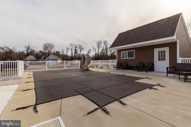 5 N Edinburgh Ct, Houston, DE 19954 - view of swimming pool with a water slide and a patio area
