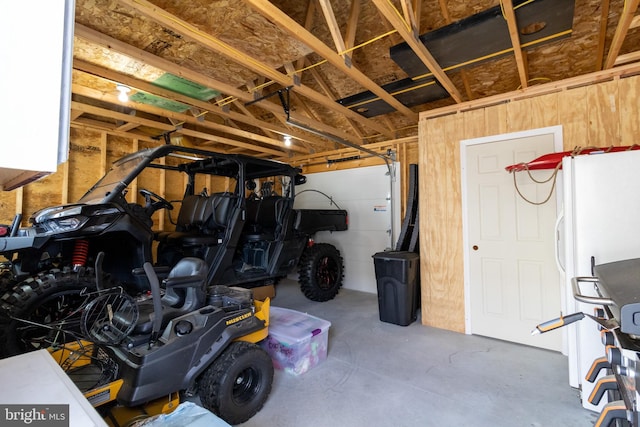 5 N Edinburgh Ct, Houston, DE 19954 - garage with freestanding refrigerator