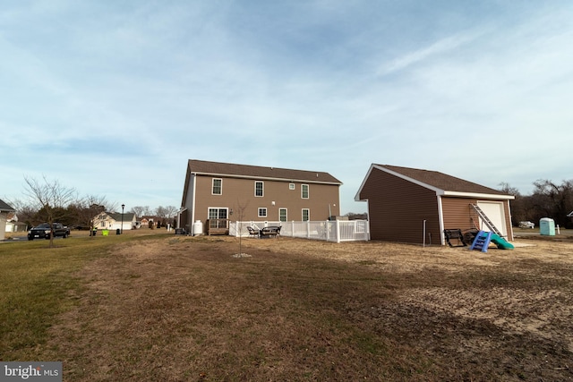 5 N Edinburgh Ct, Houston, DE 19954 - rear view of property with a detached garage and an outdoor structure