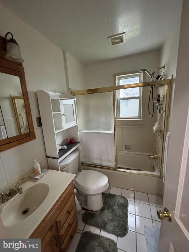 339 W Brookhaven Rd, Brookhaven, PA 19015 - full bathroom with bath / shower combo with glass door, vanity, and tile patterned flooring