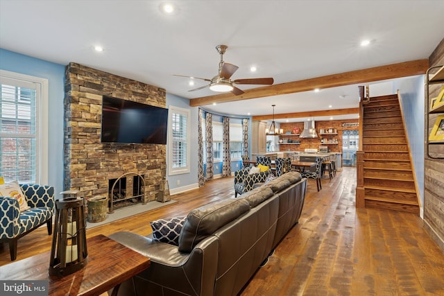 130 E State St, Media, PA 19063 - living area featuring wood finished floors, plenty of natural light, recessed lighting, ceiling fan, and beam ceiling