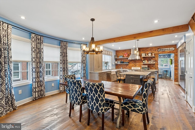 130 E State St, Media, PA 19063 - dining space featuring healthy amount of natural light, light wood-style flooring, a chandelier, recessed lighting, and beamed ceiling