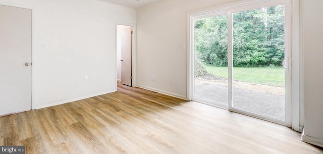 406 Christian Ln, Wallingford, PA 19086 - spare room with wood finished floors and baseboards