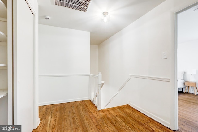 406 Christian Ln, Wallingford, PA 19086 - hallway featuring an upstairs landing and wood finished floors