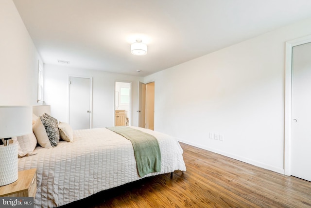 406 Christian Ln, Wallingford, PA 19086 - bedroom featuring wood finished floors and baseboards