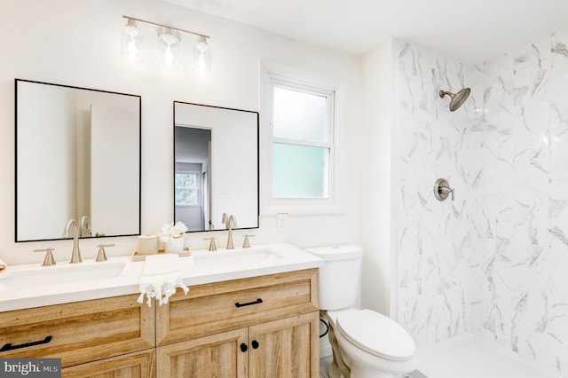406 Christian Ln, Wallingford, PA 19086 - bathroom featuring double vanity and a marble finish shower