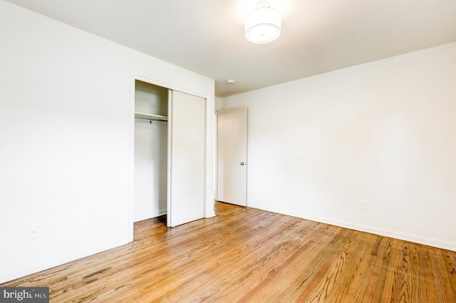 406 Christian Ln, Wallingford, PA 19086 - unfurnished bedroom with a closet and wood finished floors