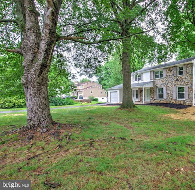 406 Christian Ln, Wallingford, PA 19086 - view of green lawn featuring a detached garage
