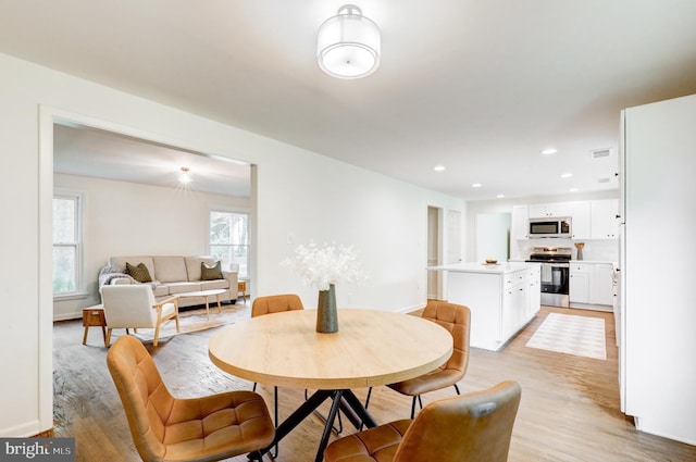406 Christian Ln, Wallingford, PA 19086 - dining room with light wood-style flooring and recessed lighting