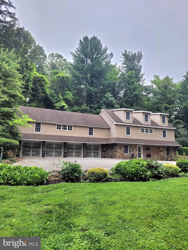 413 N Wawaset Rd, West Chester, PA 19382 - view of front of property with a garage, a front lawn, and driveway