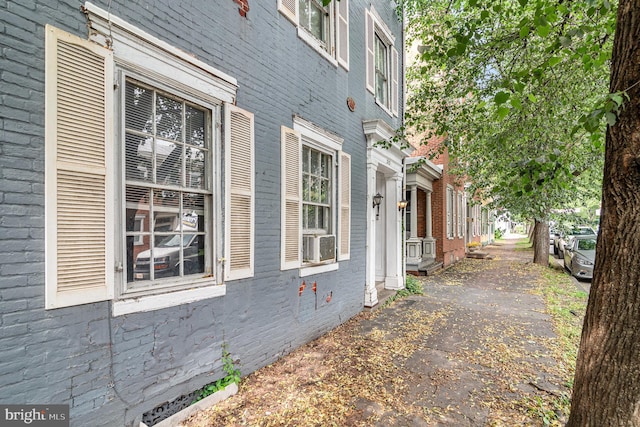 313 E Main St, Mechanicsburg, PA 17055 - view of side of home with brick siding and cooling unit