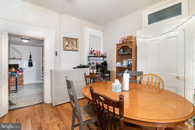 313 E Main St, Mechanicsburg, PA 17055 - dining area featuring light wood-type flooring and a fireplace