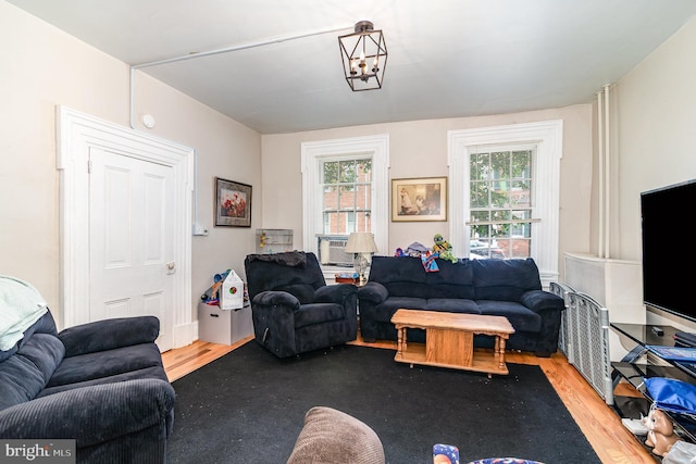 313 E Main St, Mechanicsburg, PA 17055 - living room with wood finished floors and a chandelier