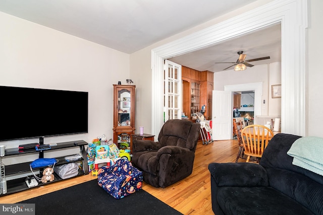 313 E Main St, Mechanicsburg, PA 17055 - living room featuring wood finished floors and a ceiling fan