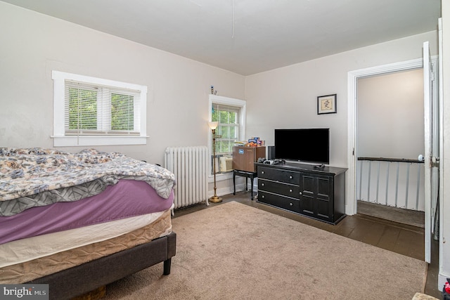313 E Main St, Mechanicsburg, PA 17055 - bedroom featuring radiator and hardwood / wood-style floors