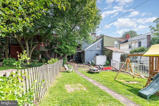 313 E Main St, Mechanicsburg, PA 17055 - view of yard with a playground and a storage unit