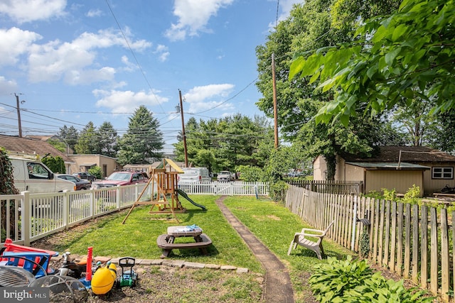 313 E Main St, Mechanicsburg, PA 17055 - fenced backyard featuring a playground