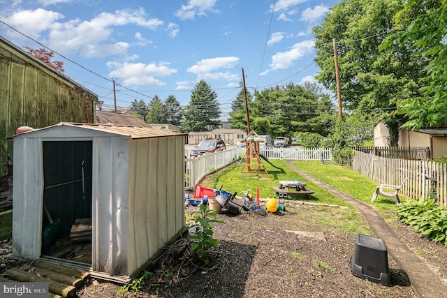 313 E Main St, Mechanicsburg, PA 17055 - fenced backyard with a shed and a playground