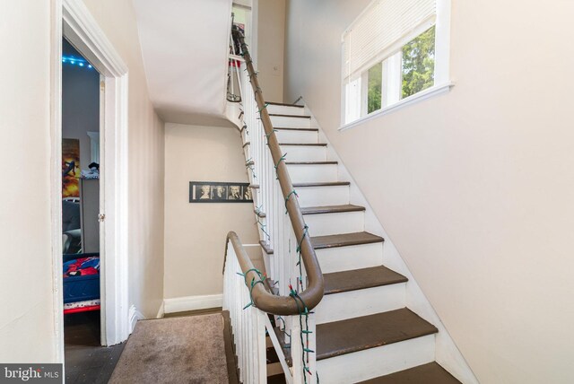 313 E Main St, Mechanicsburg, PA 17055 - stairway featuring baseboards
