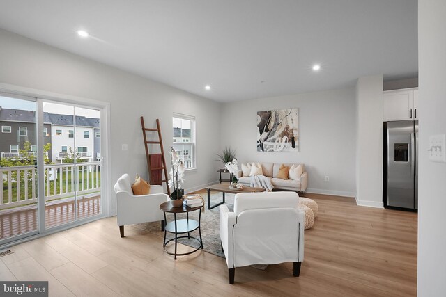 8109 Primrose Ln, Laurel, MD 20723 - living area featuring light wood-type flooring and recessed lighting