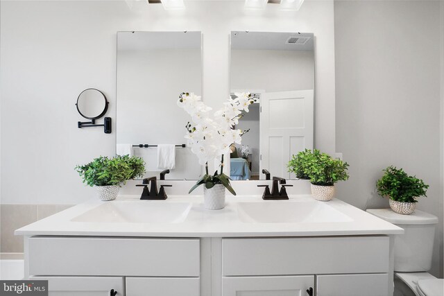 8109 Primrose Ln, Laurel, MD 20723 - bathroom with double vanity and ensuite bathroom