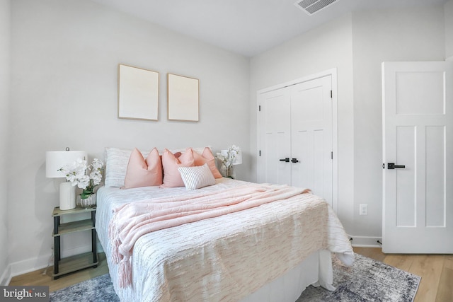 8109 Primrose Ln, Laurel, MD 20723 - bedroom featuring light wood-style flooring and a closet