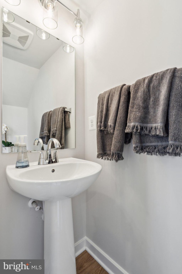 2017 Abboccato Ter SE, Leesburg, VA 20175 - bathroom with vaulted ceiling and wood finished floors