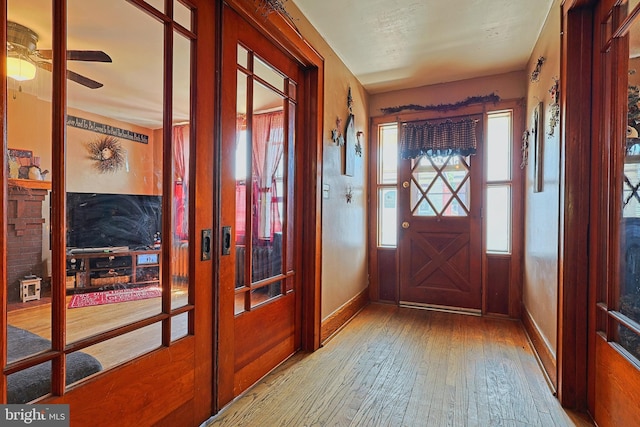 439 Columbia St, Cumberland, MD 21502 - entrance foyer with hardwood / wood-style floors, french doors, and ceiling fan