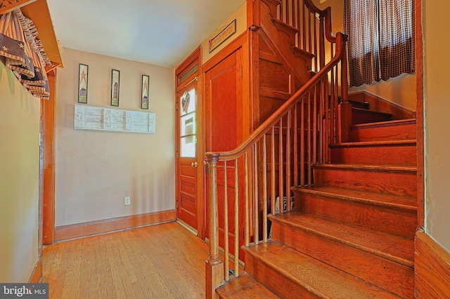 439 Columbia St, Cumberland, MD 21502 - stairs featuring wood finished floors and baseboards