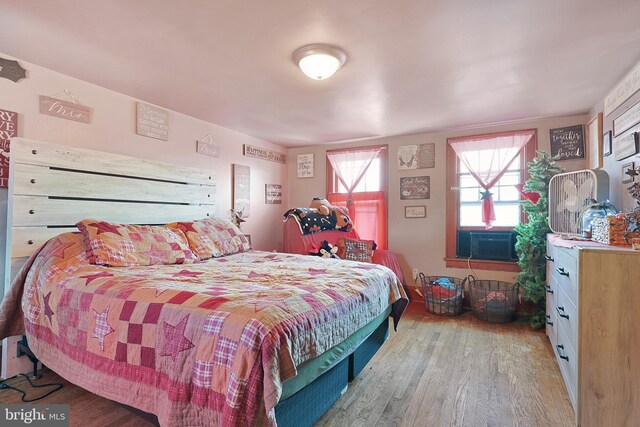 439 Columbia St, Cumberland, MD 21502 - bedroom featuring wood finished floors and cooling unit