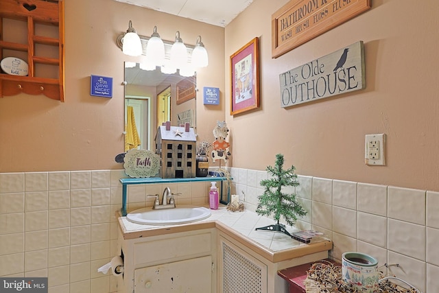 439 Columbia St, Cumberland, MD 21502 - bathroom featuring vanity, tile walls, and wainscoting