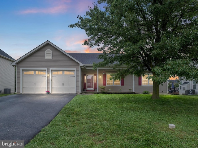 207 Drawyers Dr, Middletown, DE 19709 - single story home featuring driveway, a garage, a lawn, and a shingled roof
