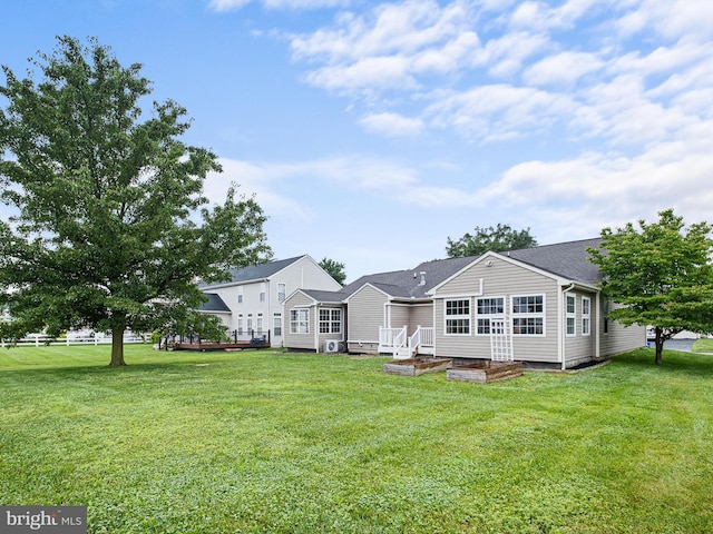 207 Drawyers Dr, Middletown, DE 19709 - rear view of house with a lawn, a wooden deck, and crawl space