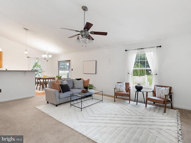 207 Drawyers Dr, Middletown, DE 19709 - living area with a chandelier, ceiling fan, vaulted ceiling, and carpet