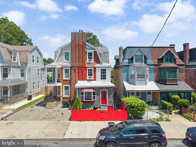 5509 Chew Ave, Philadelphia, PA 19138 - view of front of home with a residential view and a chimney