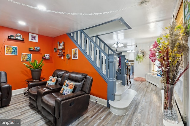 5509 Chew Ave, Philadelphia, PA 19138 - living room with stairs, wood finished floors, and a chandelier