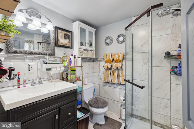 5509 Chew Ave, Philadelphia, PA 19138 - bathroom featuring vanity, a shower stall, and tile walls