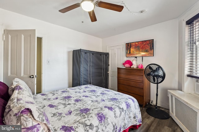 5509 Chew Ave, Philadelphia, PA 19138 - bedroom featuring radiator, dark wood finished floors, and ceiling fan