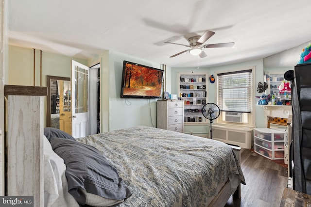 5509 Chew Ave, Philadelphia, PA 19138 - bedroom with cooling unit, dark wood finished floors, radiator, and a ceiling fan