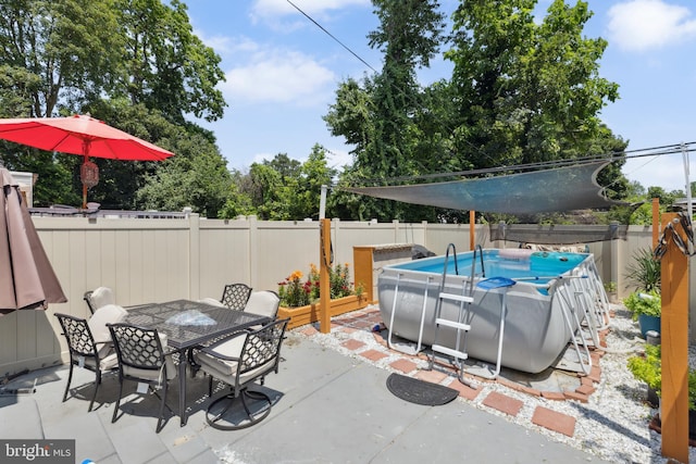 5509 Chew Ave, Philadelphia, PA 19138 - fenced backyard featuring a patio and outdoor dining space